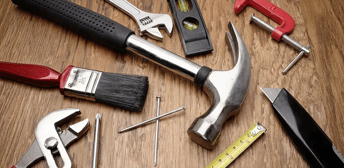 Handyman tools laid out for home repair and maintenance work in Des Moines, IA